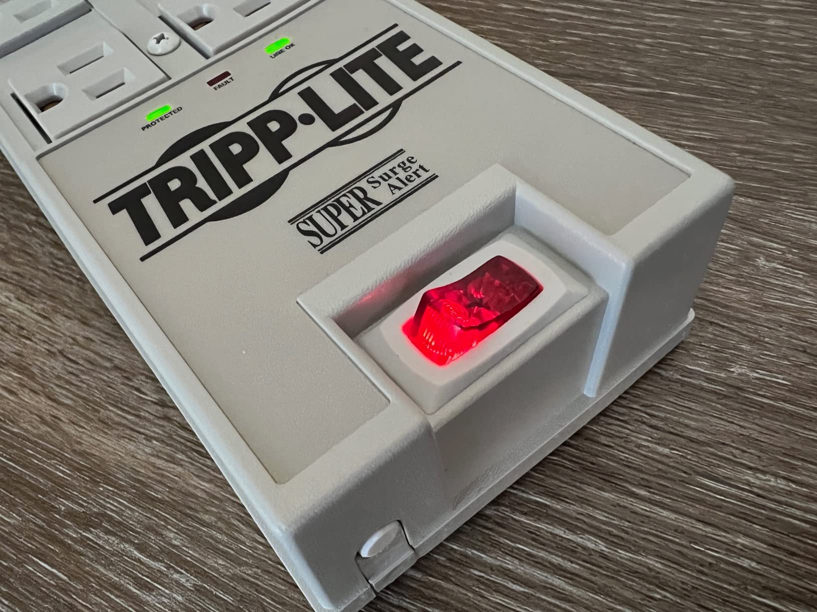 Tripp Lite 6 Outlet Surge Protector Power Strip, 6ft Cord, Right-Angle Plug, & $50,000 Insurance (TR-6) Grey customer photo 1