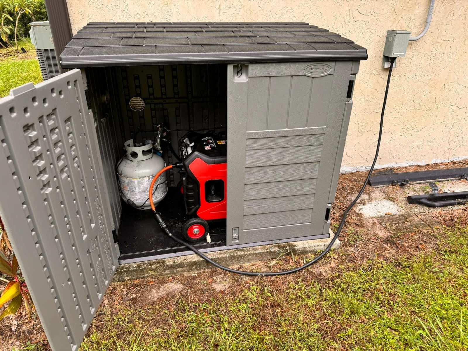 Suncast 34 Cu Ft Horizontal Resin Storage Shed - Outdoor Storage Shed with Floor Included, Lockable, Weatherproof, Fits Small to Medium Trash Cans, Generators, & Garden Tools, Stoney Black customer photo 1