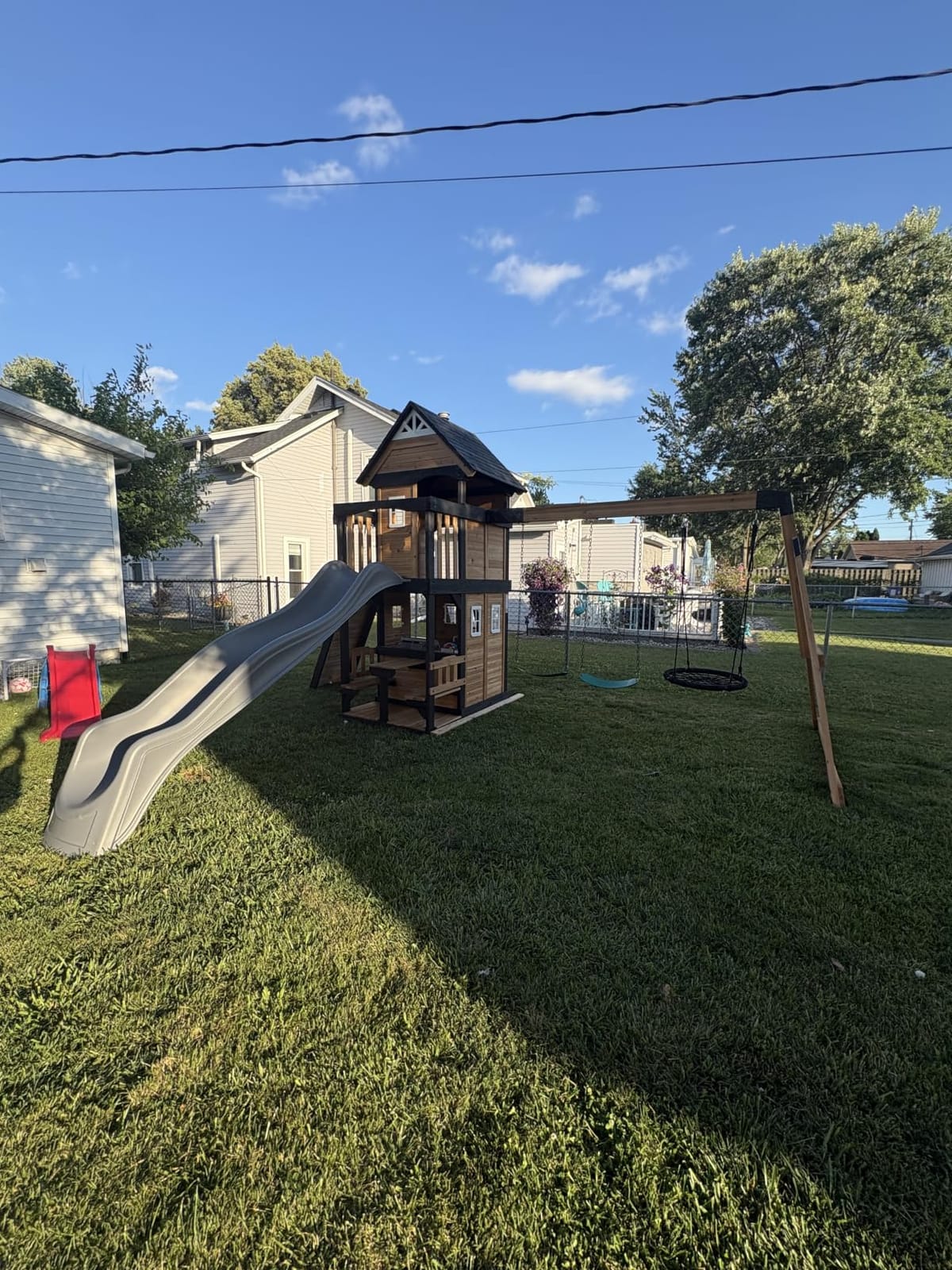 Backyard Discovery Canyon Creek White Cedar Wood Swing Set with Wave Slide, Clubhouse, Play Kitchen, Picnic Area, Belt Swings, Web Swing, Rock Wall, Balconies, Playhouse, Step Ladder, Outdoor Playset customer photo 2