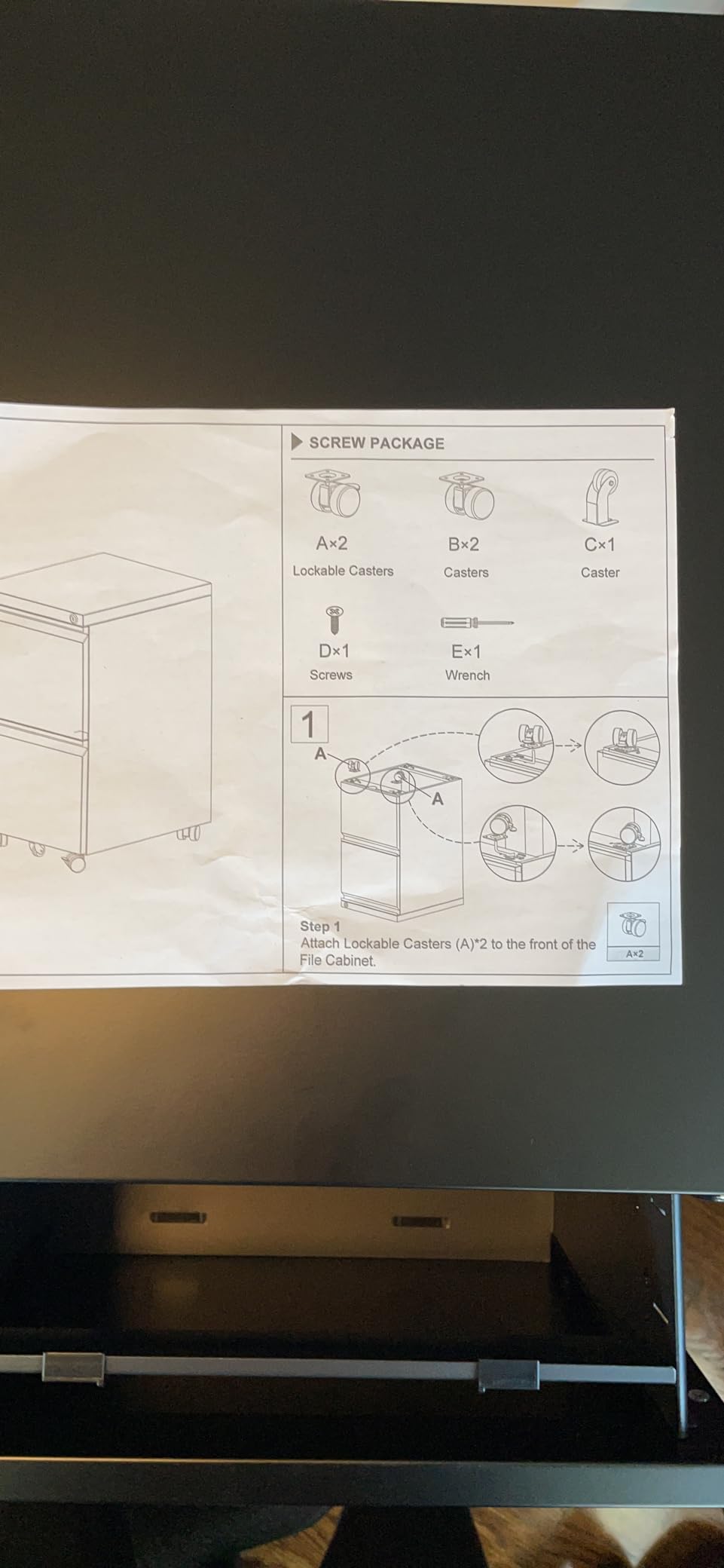 4 Drawer Metal File Cabinet with Lock and Wheels, Black | Lockable narrow vertical filing cabinet with anti-tilt interlock; fits letter/legal hanging folders; assembly required customer photo 1
