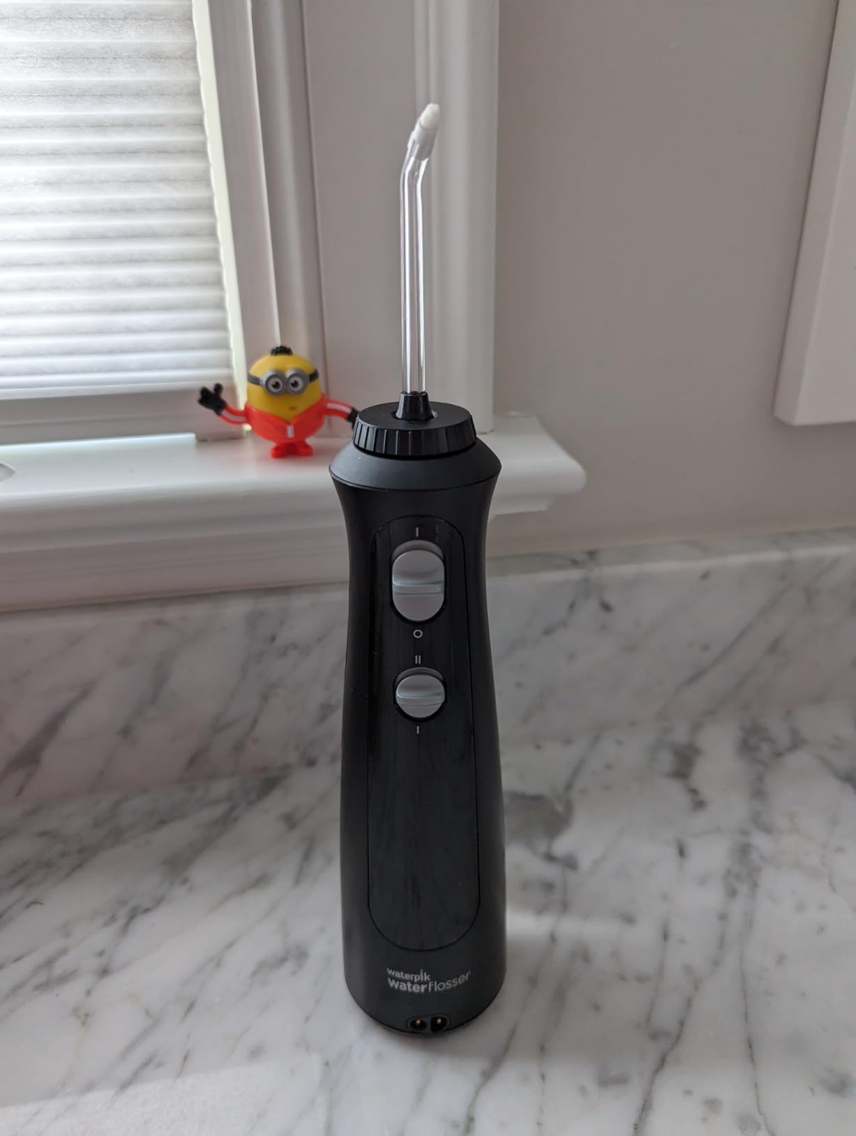 Waterpik Cordless Pearl Portable Water Flosser, Rechargeable, White | 2 Settings, 4 Tips, for Daily Gum Health & Cleaning Teeth, Dental Braces, Implants, ADA Accepted, WF-13 Amazon Exclusive customer photo 2