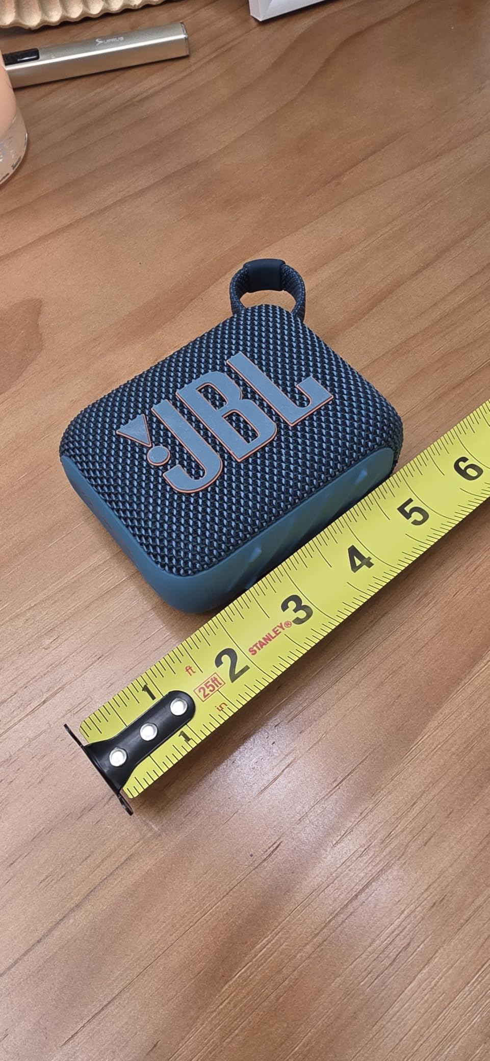 JBL Go 4 - Ultra-Portable, Waterproof and Dustproof Bluetooth Speaker, Big JBL Pro Sound with Punchy bass, 7-Hour Built-in Battery, Made in Part with Recycled Materials (Black) customer photo 2
