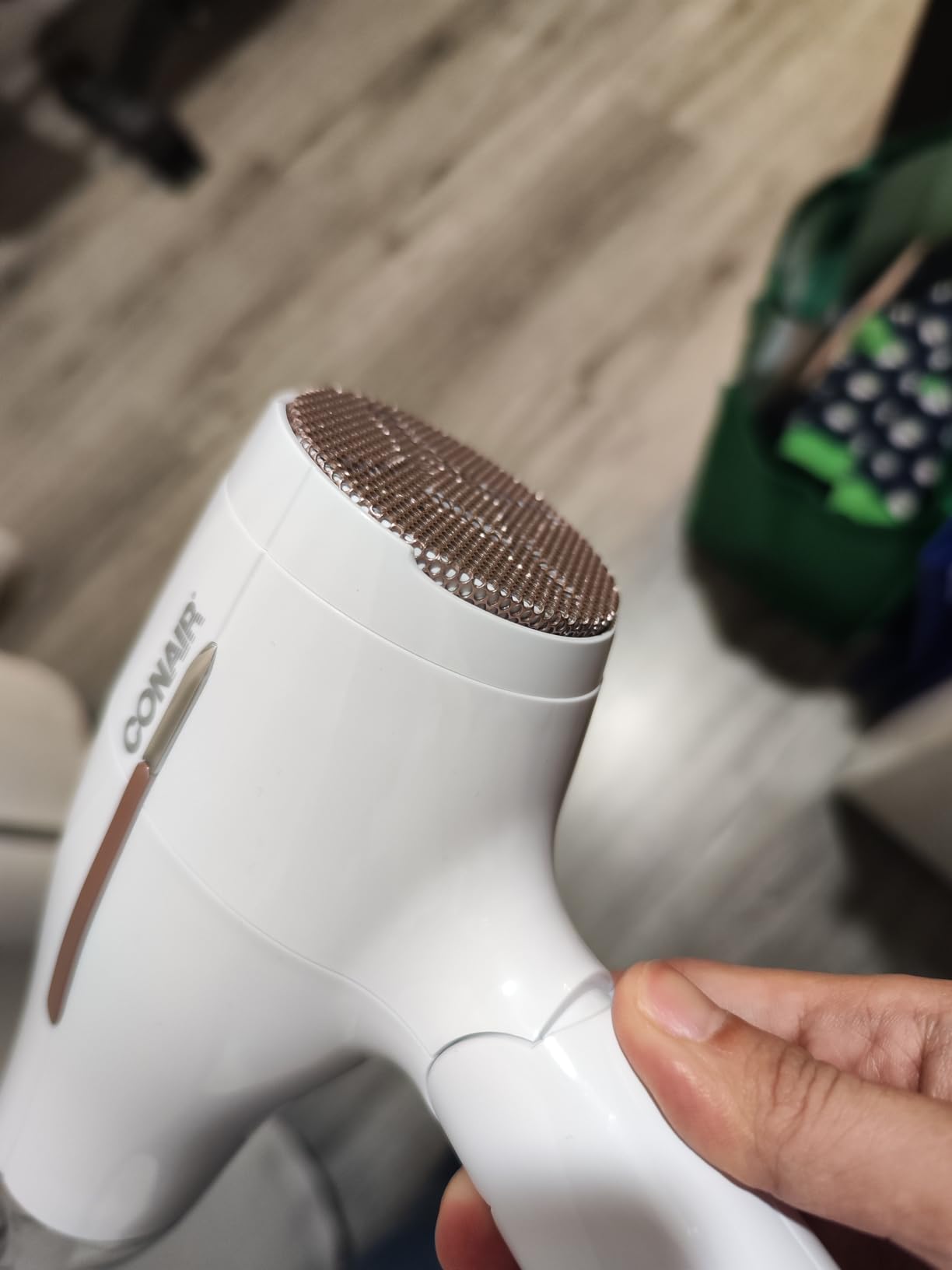 Conair Worldwide Folding Handle Hair Dryer with Concentrator & Diffuser, 1875W Travel Blow Dryer with Smart Voltage Technology, Ionic Conditioning Fights Frizz, 3 Heat & 2 Speed Settings, Purple customer photo 1
