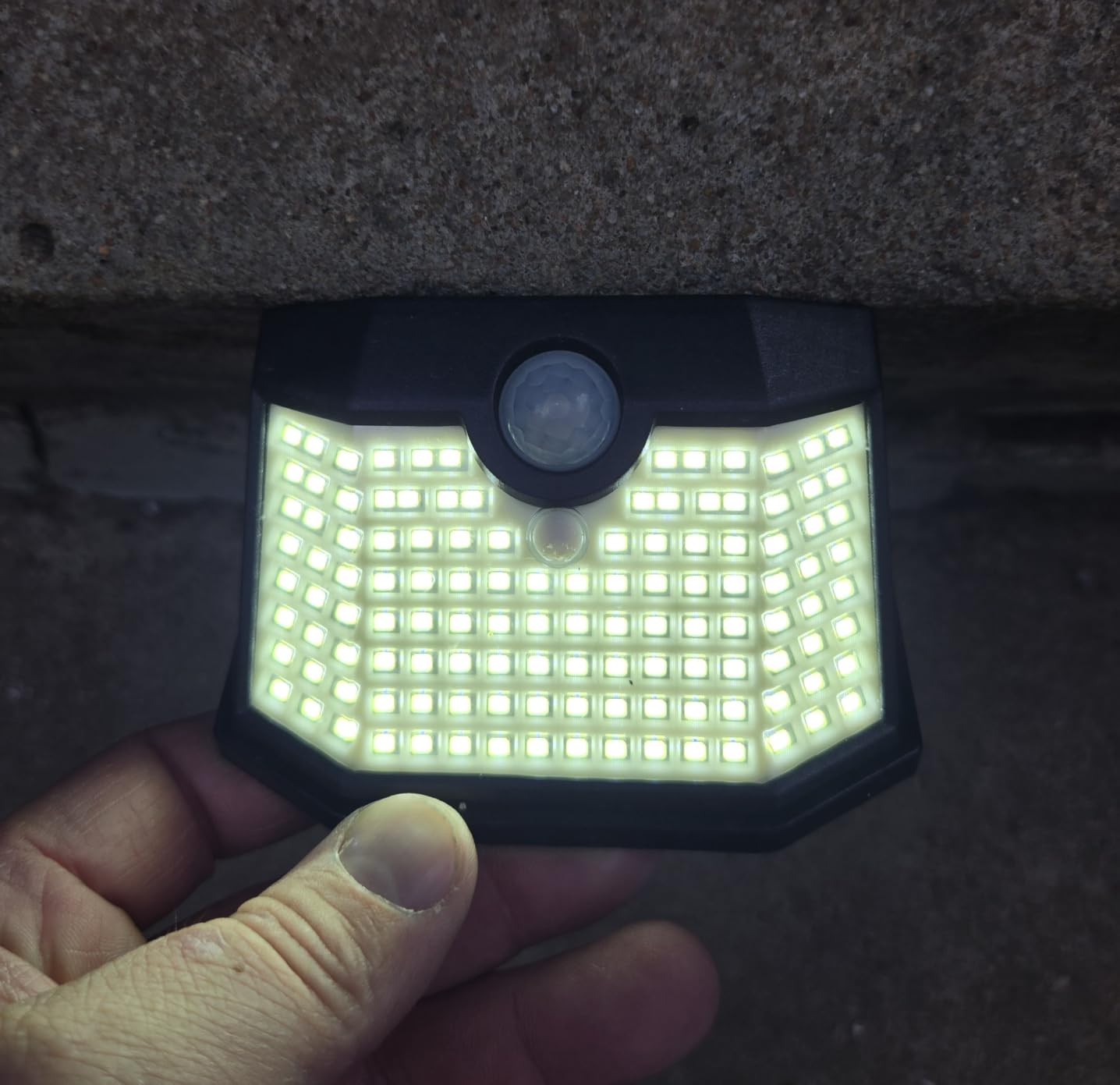 HMCITY 120 LED Outdoor Solar Lights with Motion Sensor and 3 Lighting Modes, IP65 Waterproof Wide Solar Wall Lights Ideal for Garden Patio Yard (Front Button 6Packs, Black Shell-Daylight White) customer photo 1